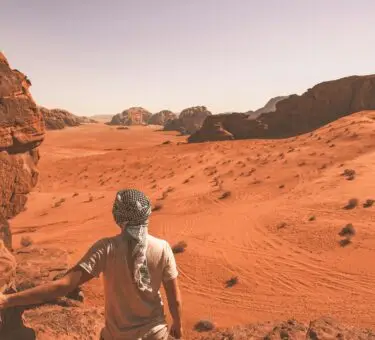 Tourists staying safe while traveling during a heat advisory in a hot destination